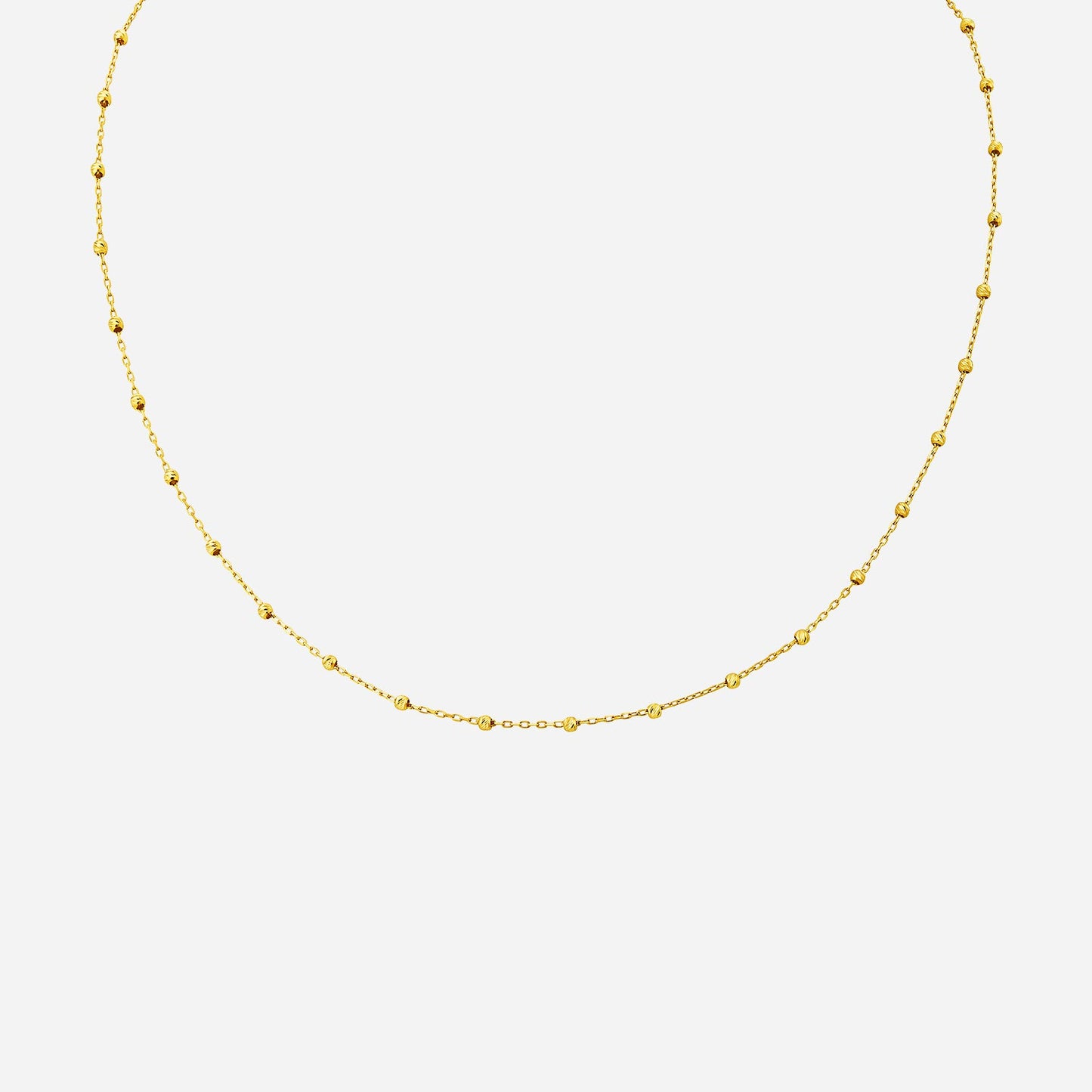 bead chain necklace in 22k yellow gold with a sequenced design of shining gold beads. perfect for layering.