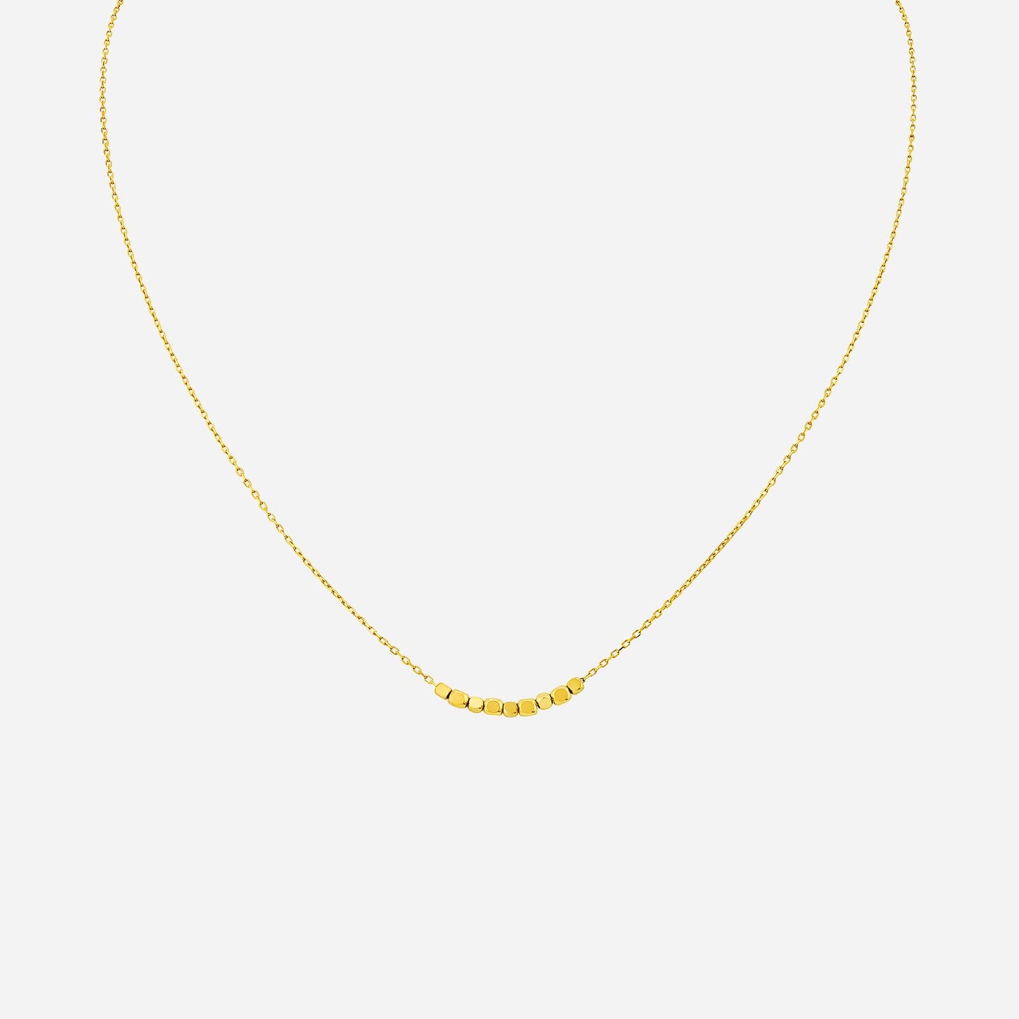beaded necklace in 22k yellow gold featuring nine smooth round beads on a delicate chain design.