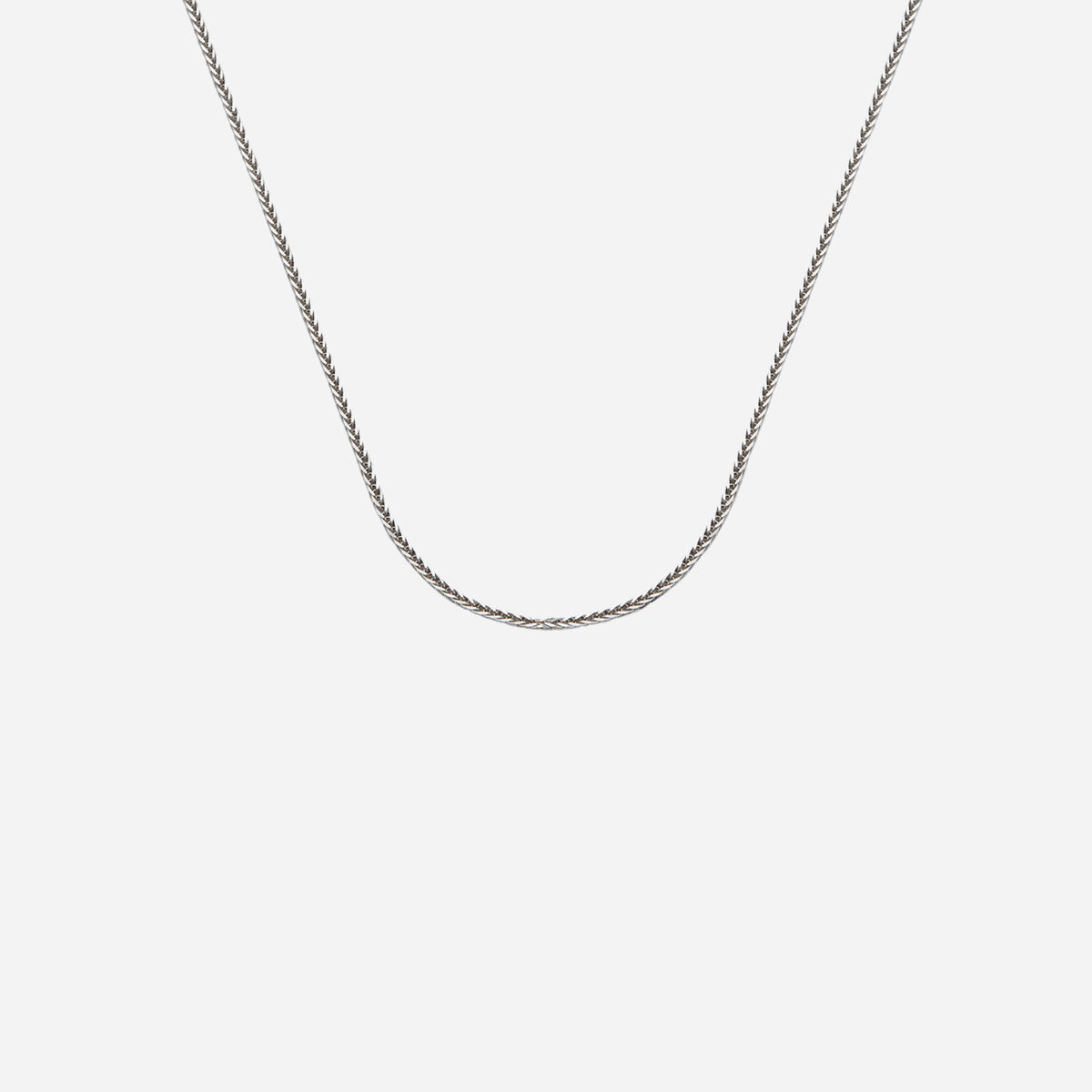 spiga chain in lustrous 18k white gold, featuring a classic braided design, perfect for pendants.