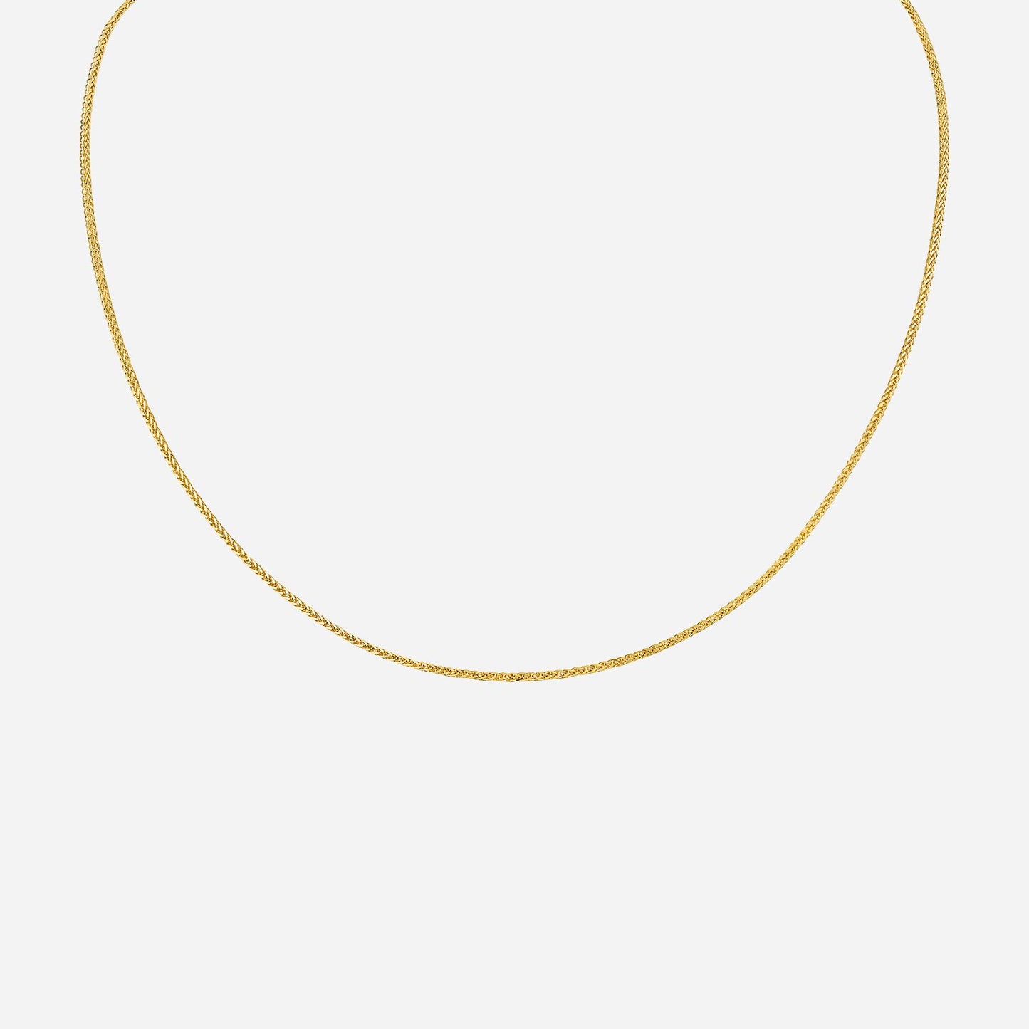 spiga chain in 18k yellow gold with a sleek, twisted design, perfect for showcasing pendants.