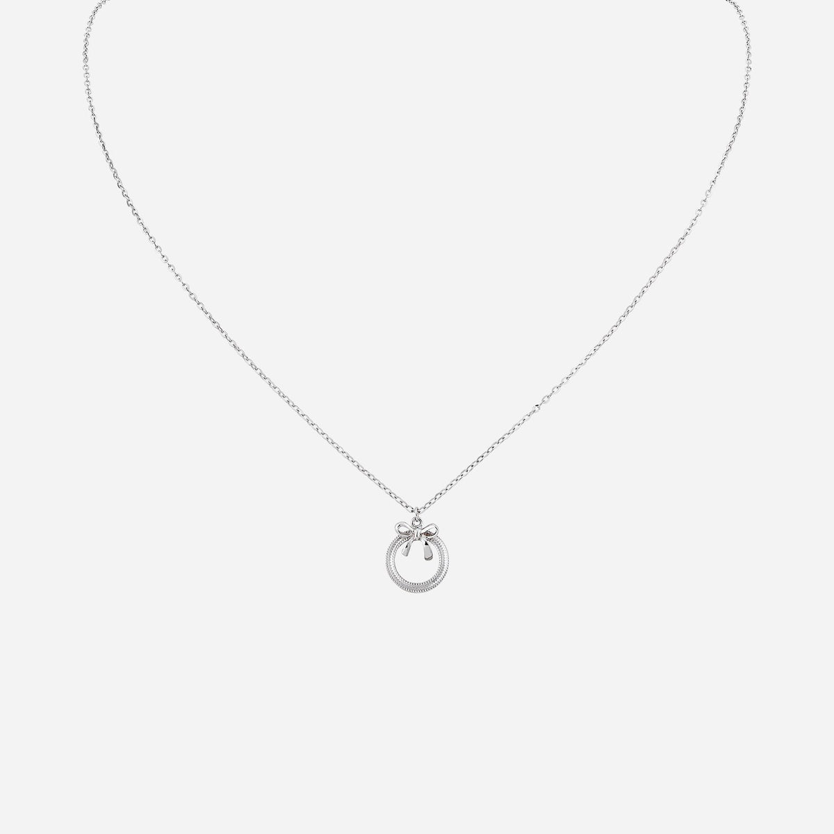 ribbon ring necklace in 18k white gold with a delicate bow design, exuding elegance and timeless beauty.