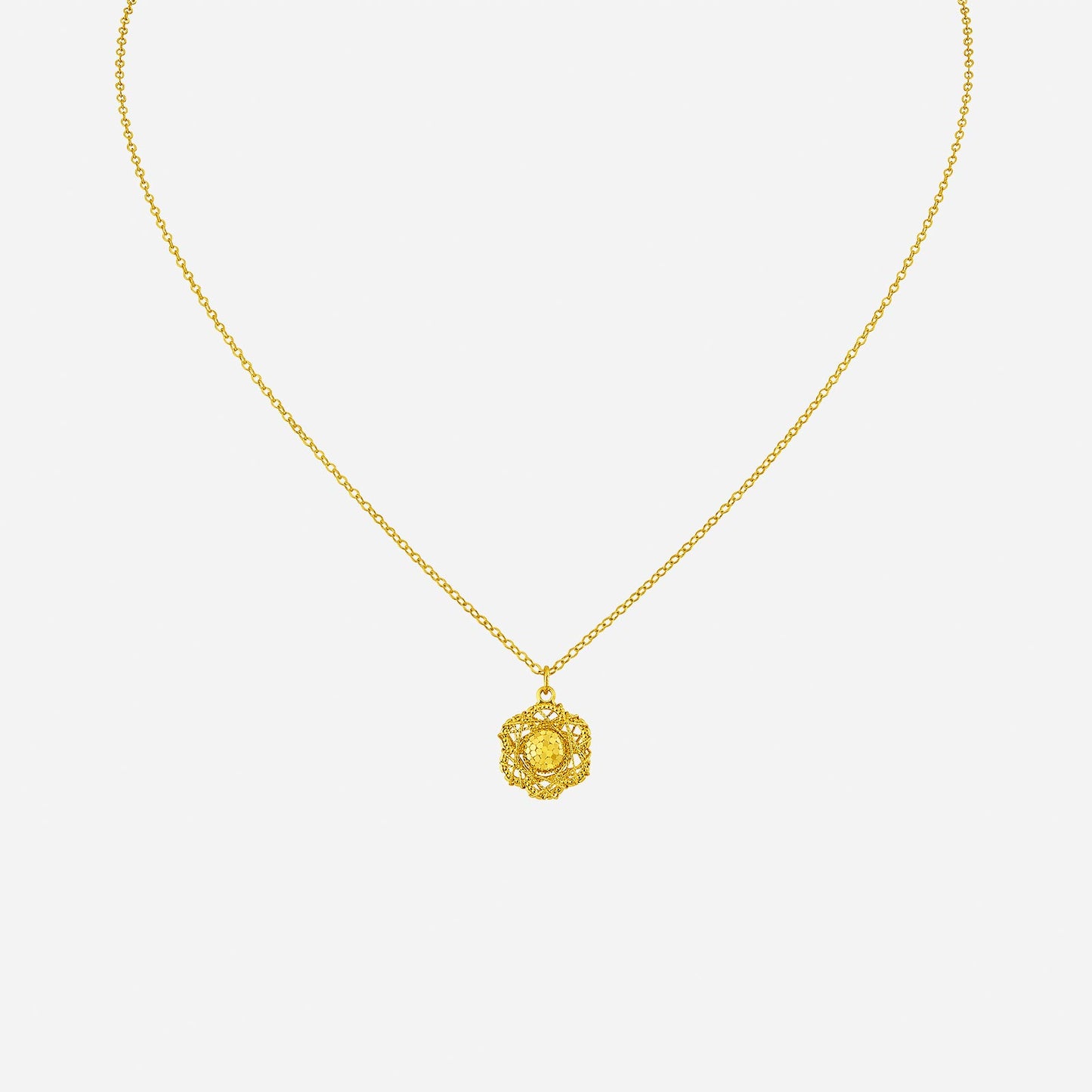 tweed floral necklace in 24k yellow gold with a delicate floral pendant design on a chain.