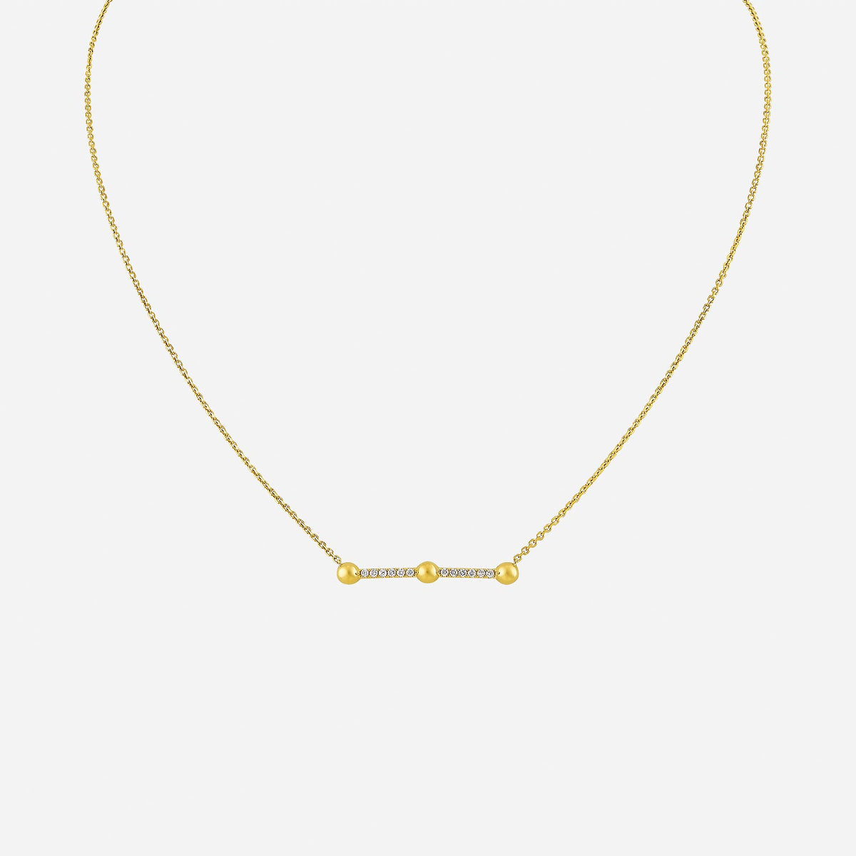 line of light diamond necklace in 18k yellow gold with sleek bar and sparkling diamonds, accented by polished gold spheres.