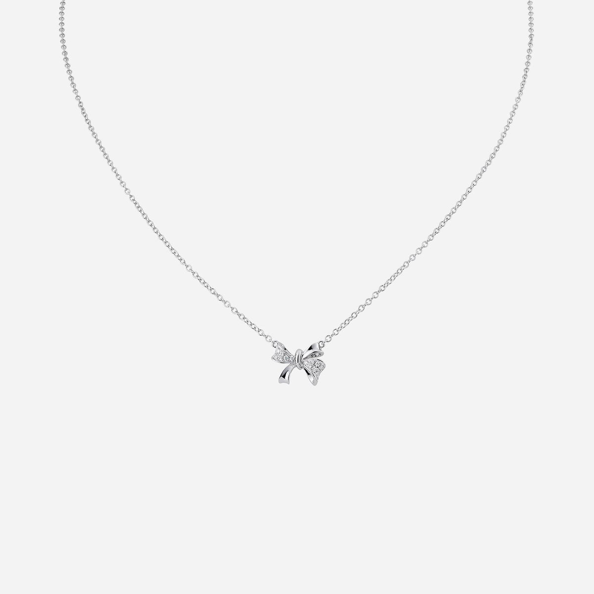 classic ribbon necklace in 18k white gold, featuring delicate diamond accents for timeless elegance.