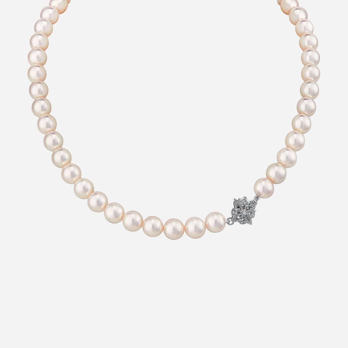 akoya pearl necklace in soft pink overtone with diamond-set clasp in 18k white gold, featuring 47 hand-selected pearls.