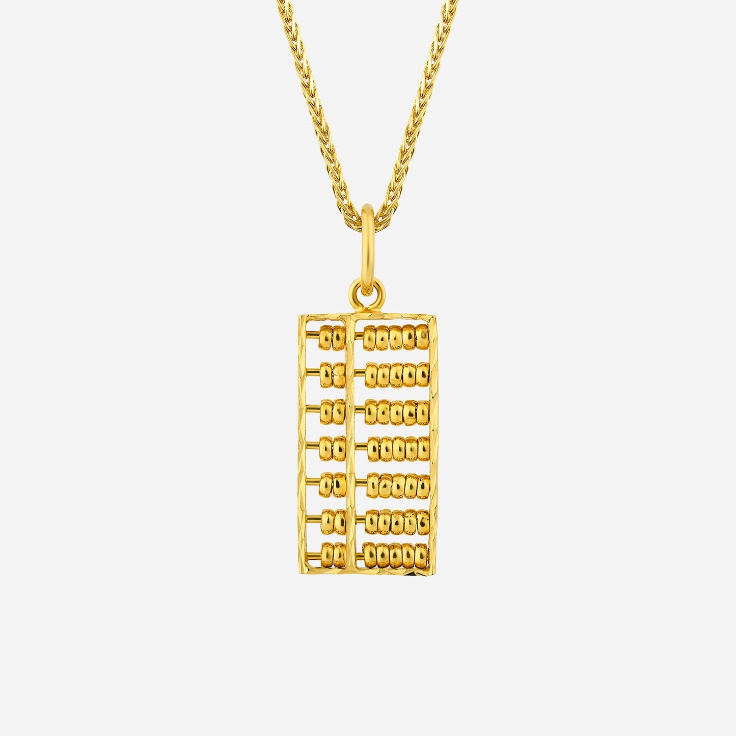 abacus pendant in 22k yellow gold featuring intricate bead details and a unique abacus design.