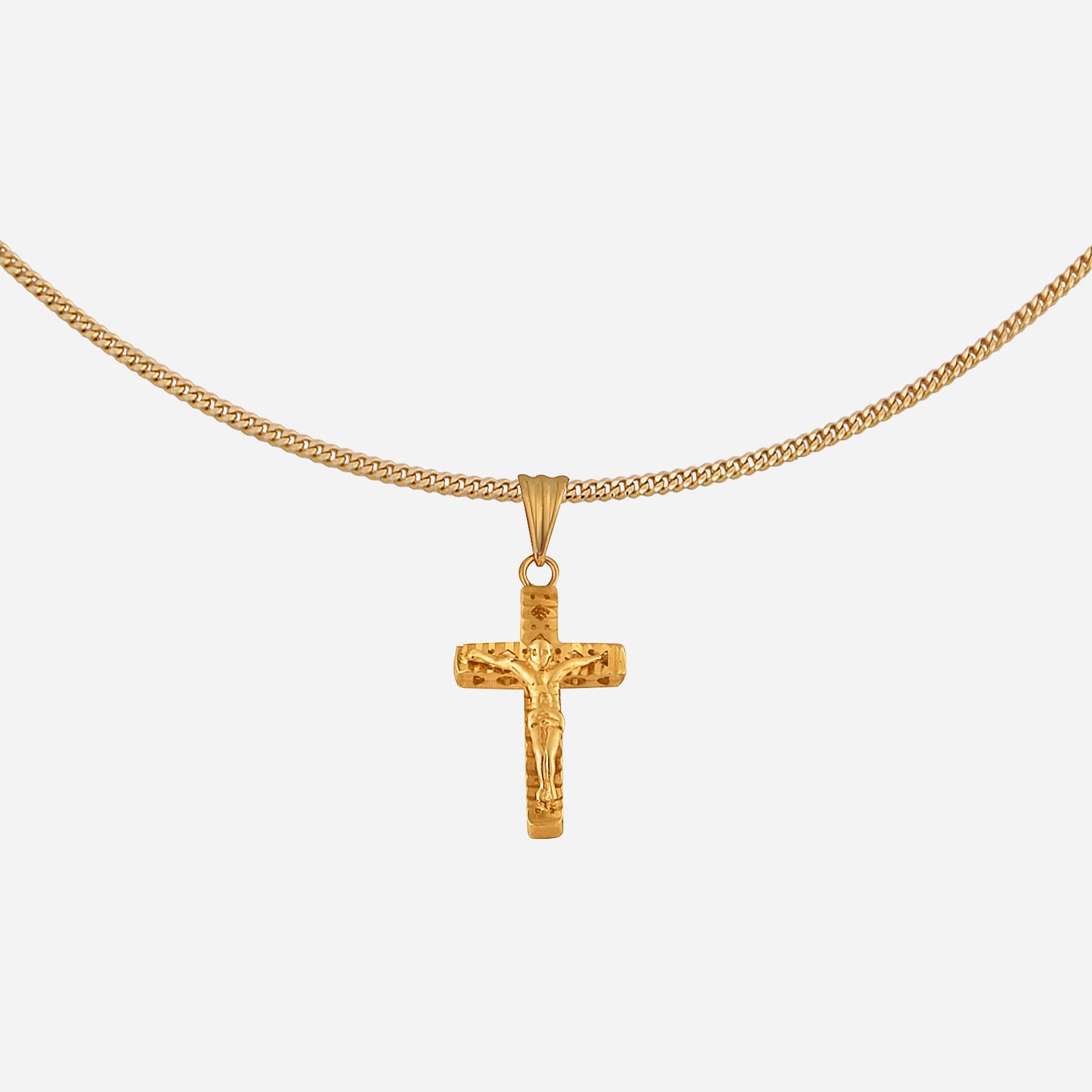 22k yellow gold crucifix pendant with intricate detailing, symbolizing faith and love, chain not included.