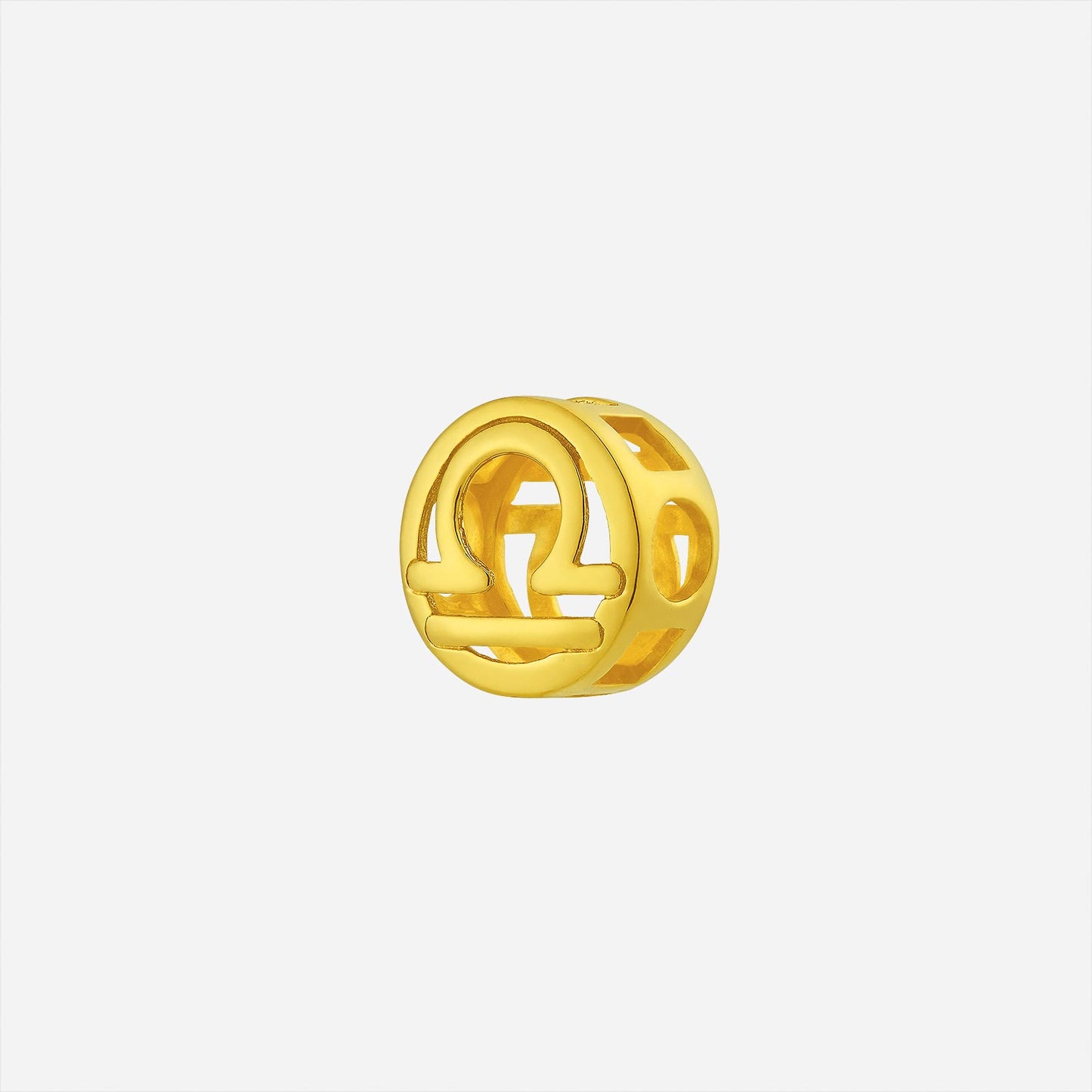 libra charm pendant in 22k yellow gold with open-cut circular design and polished finish.