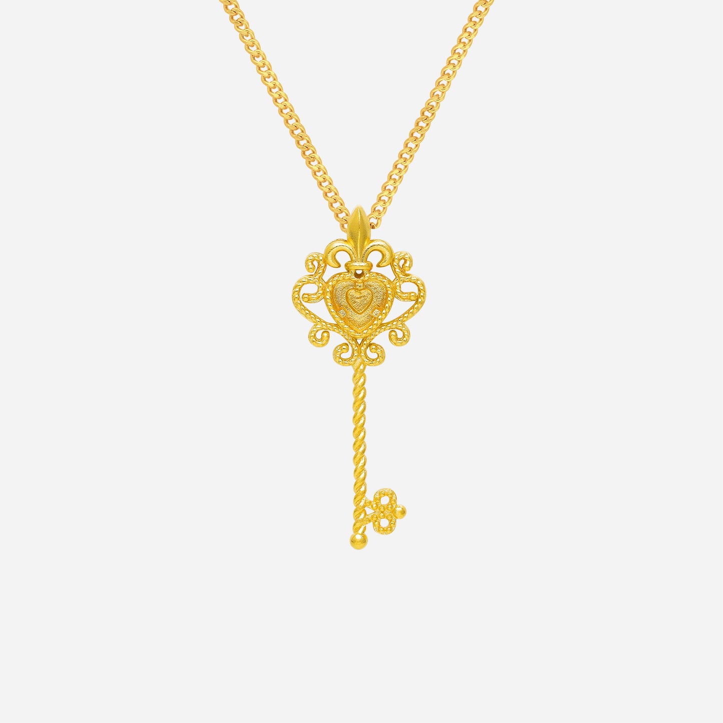 starlight key pendant in 22k yellow gold with ornate heart design and twisted key shape.