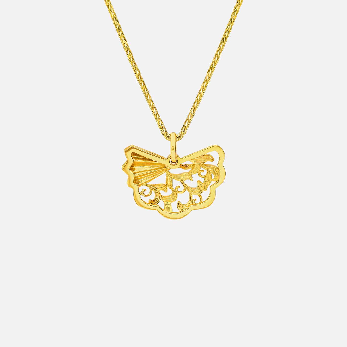 legacy fan pendant in 22k yellow gold, featuring intricate lacework in a graceful fan silhouette.