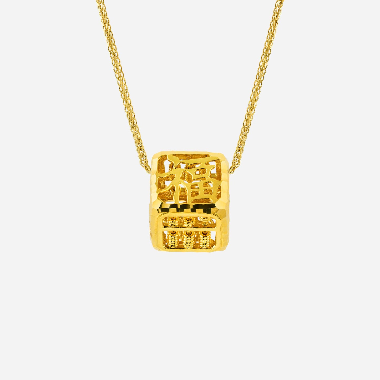 cube abacus pendant in 22k yellow gold with textured design and chinese character detail. chain sold separately.