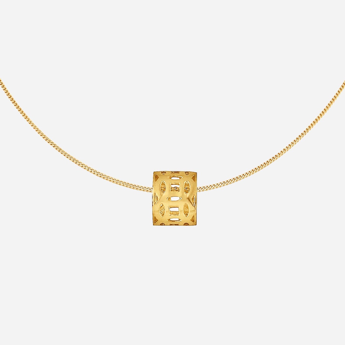 22k yellow gold pendant designed as an ancient chinese coin with intricate cutout patterns. chain sold separately.