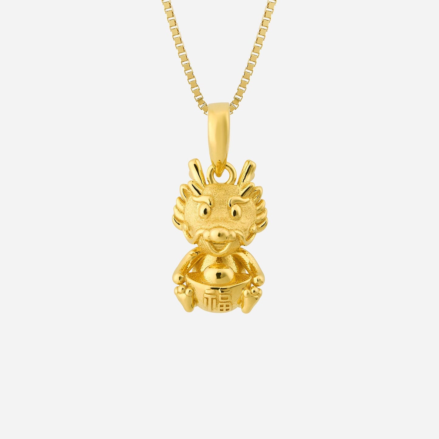 majestic yellow gold dragon pendant holding a prosperity charm, symbolizing abundance and good fortune.