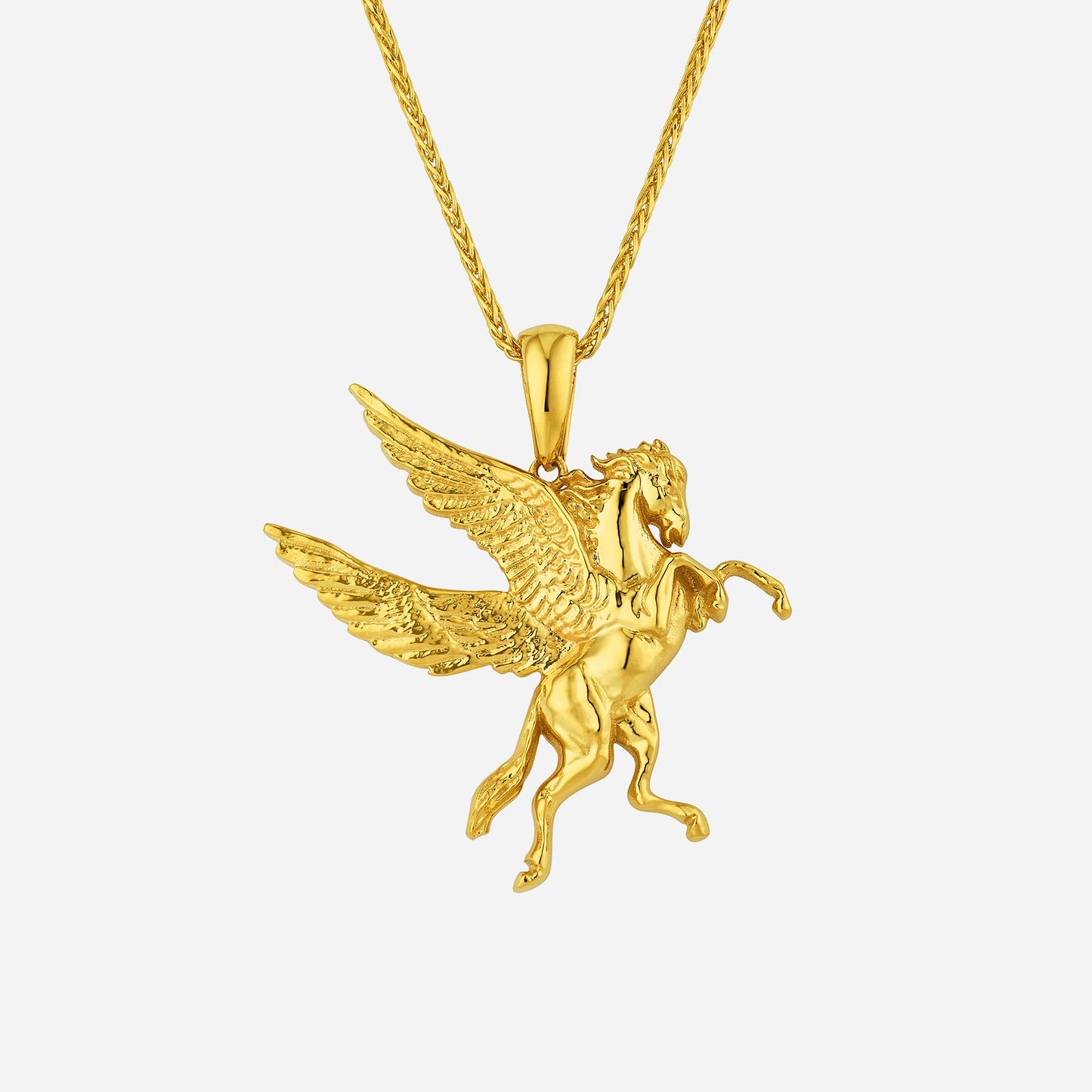 pegasus pendant in 22k yellow gold featuring detailed wings and horse design, symbolizing freedom and dreams.