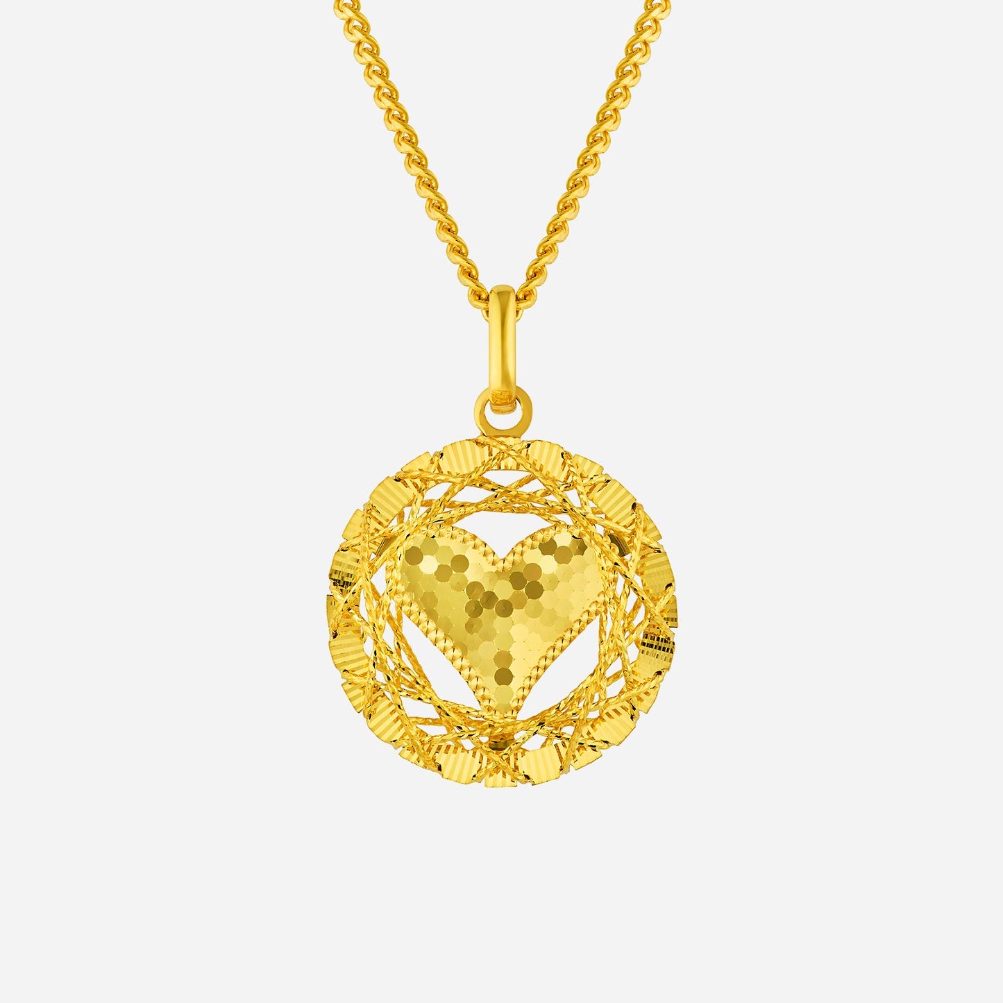 tweed cut heart pendant in 22k yellow gold with a nest-like design and shimmering heart centerpiece.