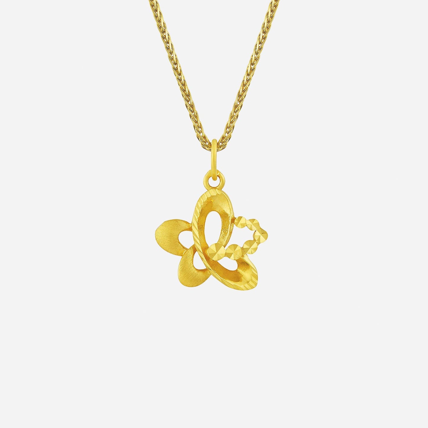 blooming floral pendant in 22k yellow gold with intricate floral design and polished finish, hanging from a chain.
