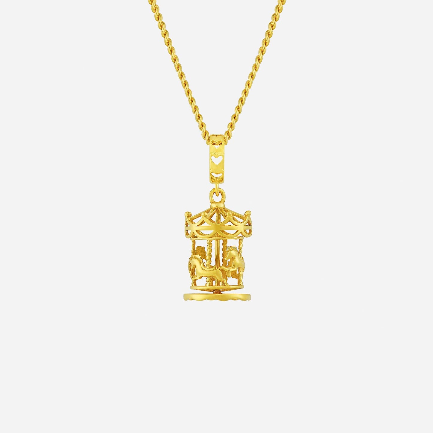 22k yellow gold fantasy carousel charm with intricate detailing and two carousel horses for a whimsical touch.