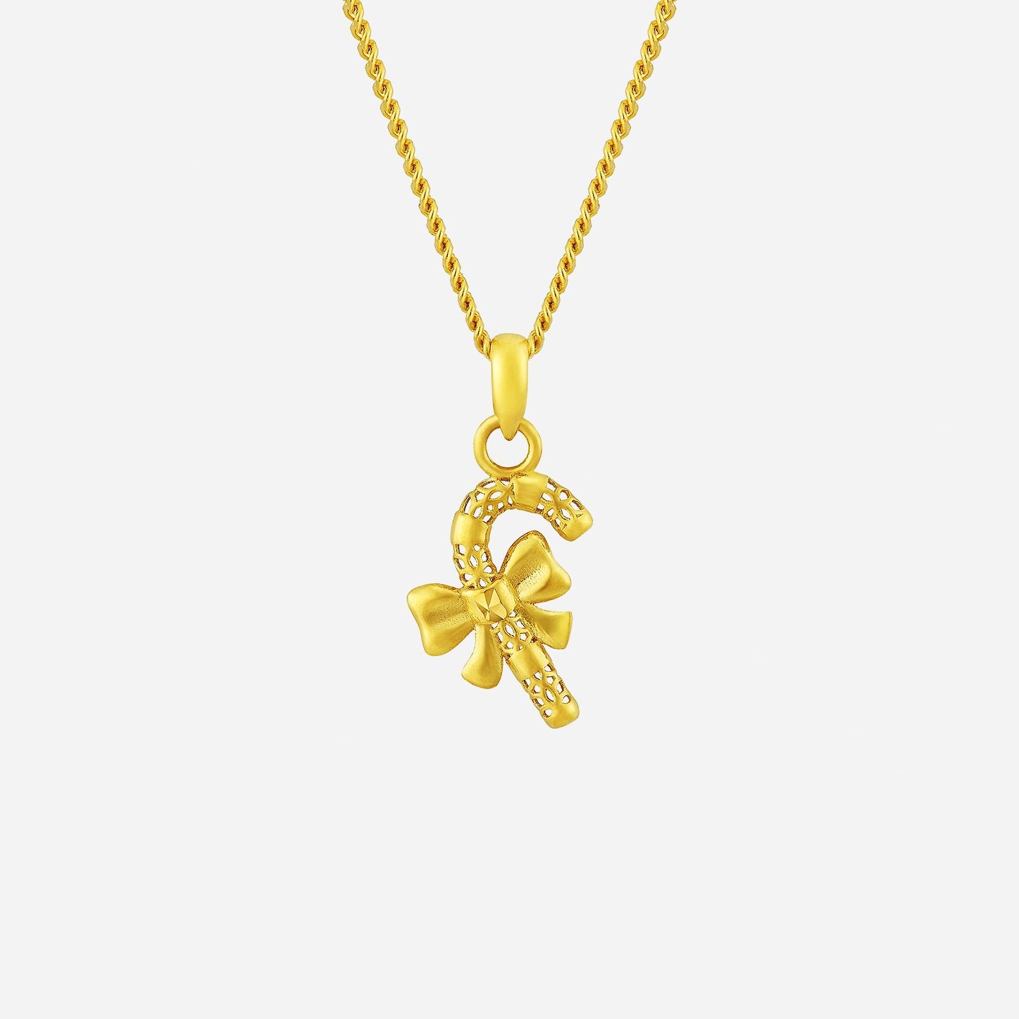 22k yellow gold candy cane pendant with detailed bow, perfect for celebrating christmas joy in style.