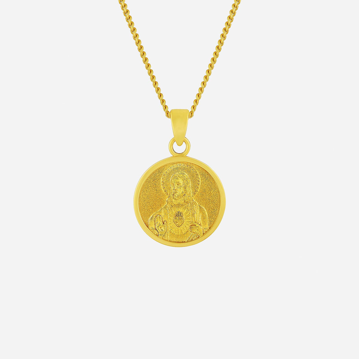 sacred heart pendant in 22k yellow gold featuring detailed religious design with a chain, symbolizing faith and devotion.