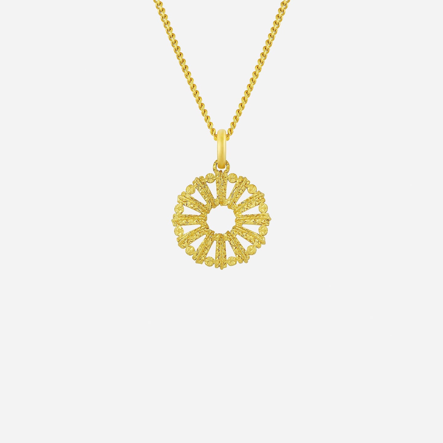 glowy ray pendant in 22k yellow gold with a radiant sunburst design and intricate detailing. perfect for any occasion.