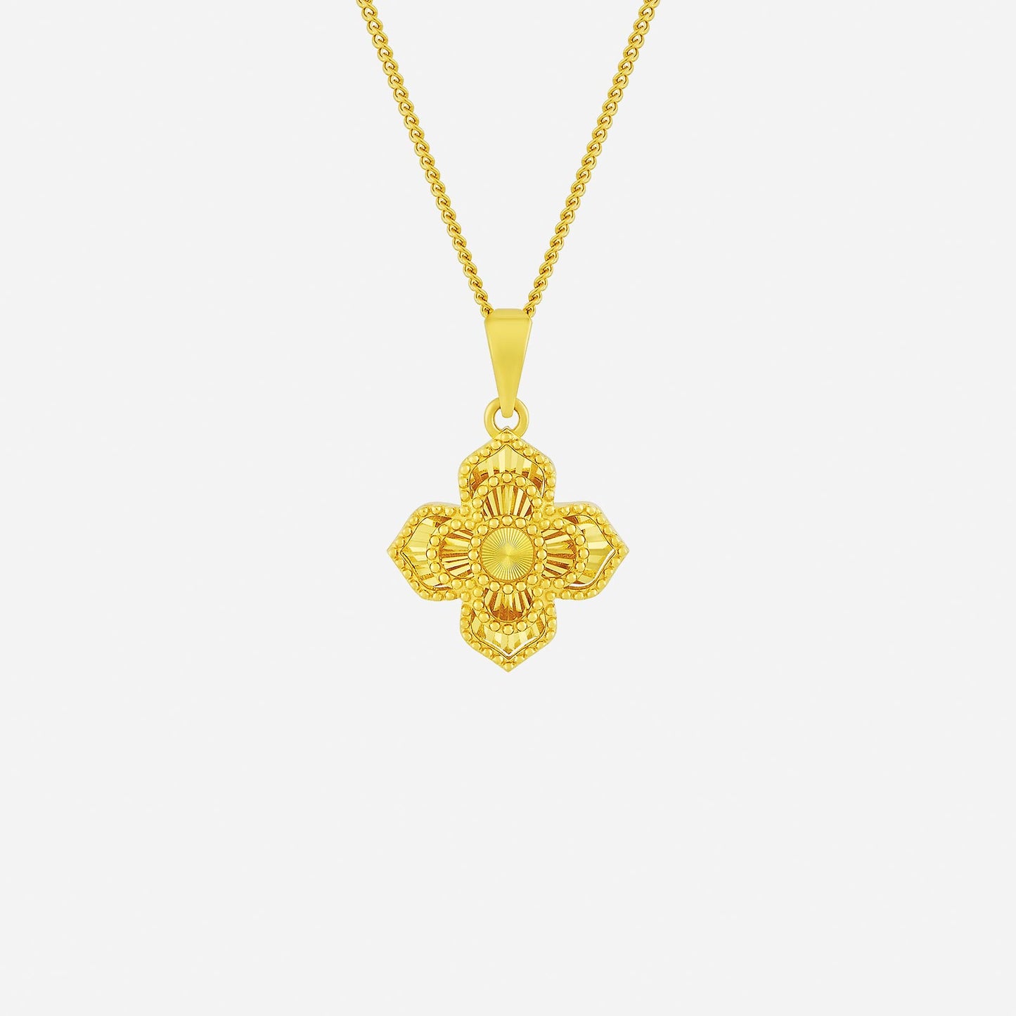 cornus in bloom pendant in 22k yellow gold with floral design and textured petal-like relief. chain sold separately.