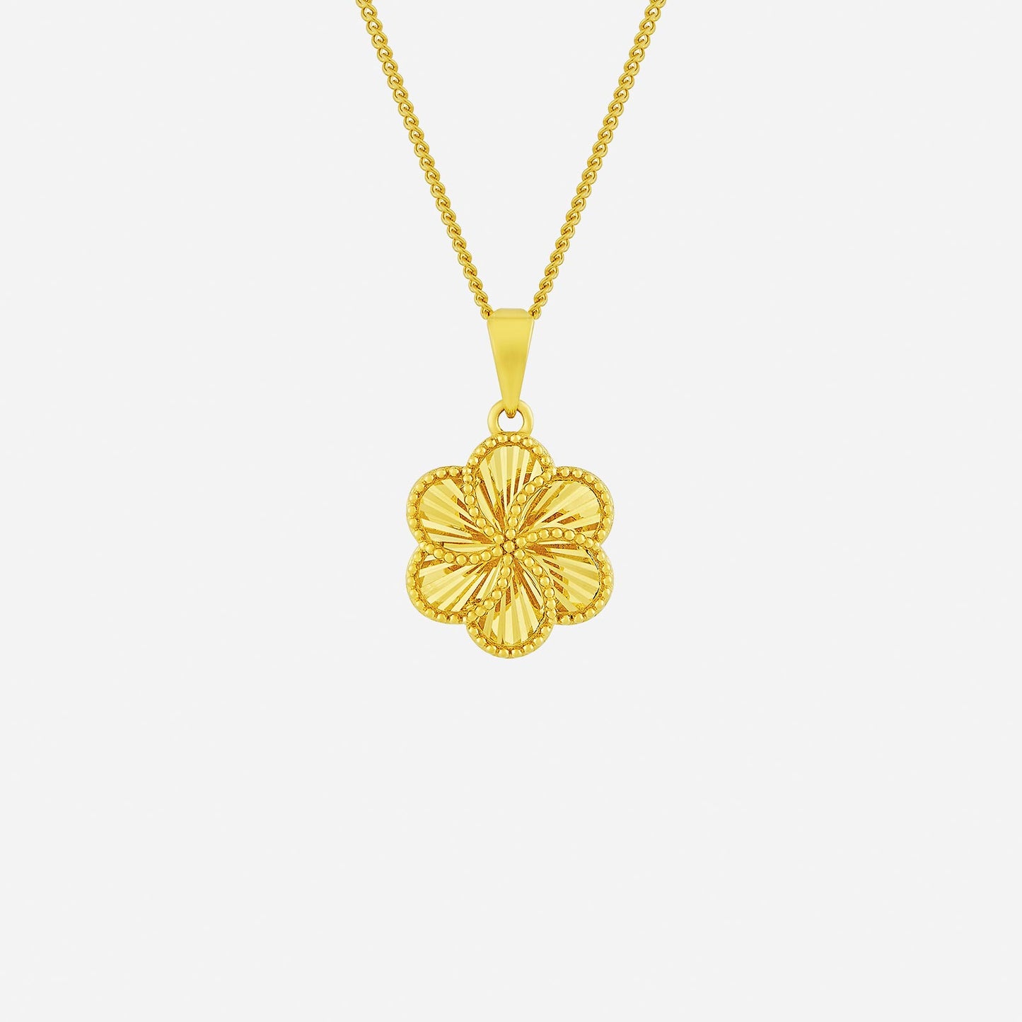 anemone flower pendant in 22k yellow gold with intricate petal detailing and light-play textures.