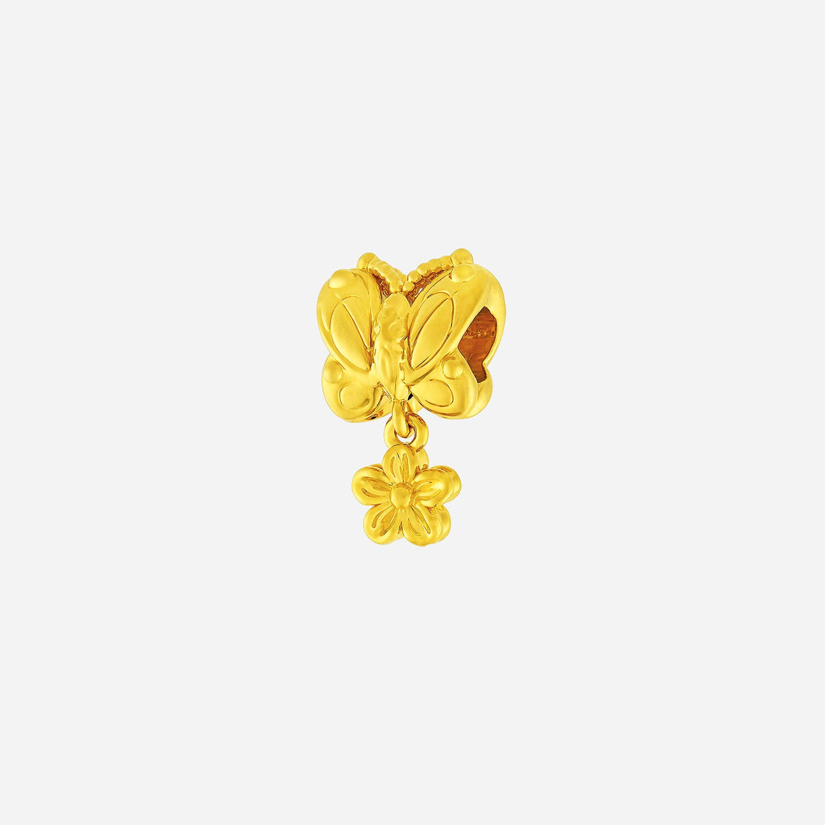 meadow butterfly charm in 22k yellow gold with delicately sculpted wings and a dangling floral accent.