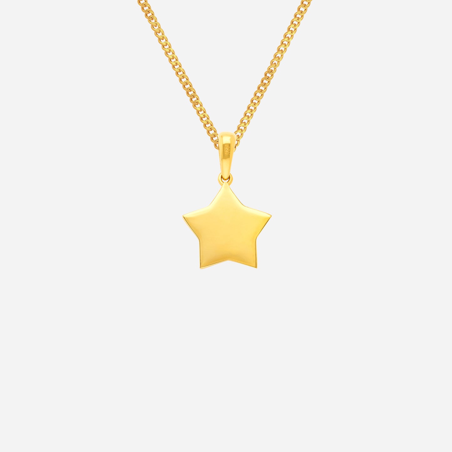 bling star pendant in 22k yellow gold with a sleek polished finish and textured star design. chain not included.