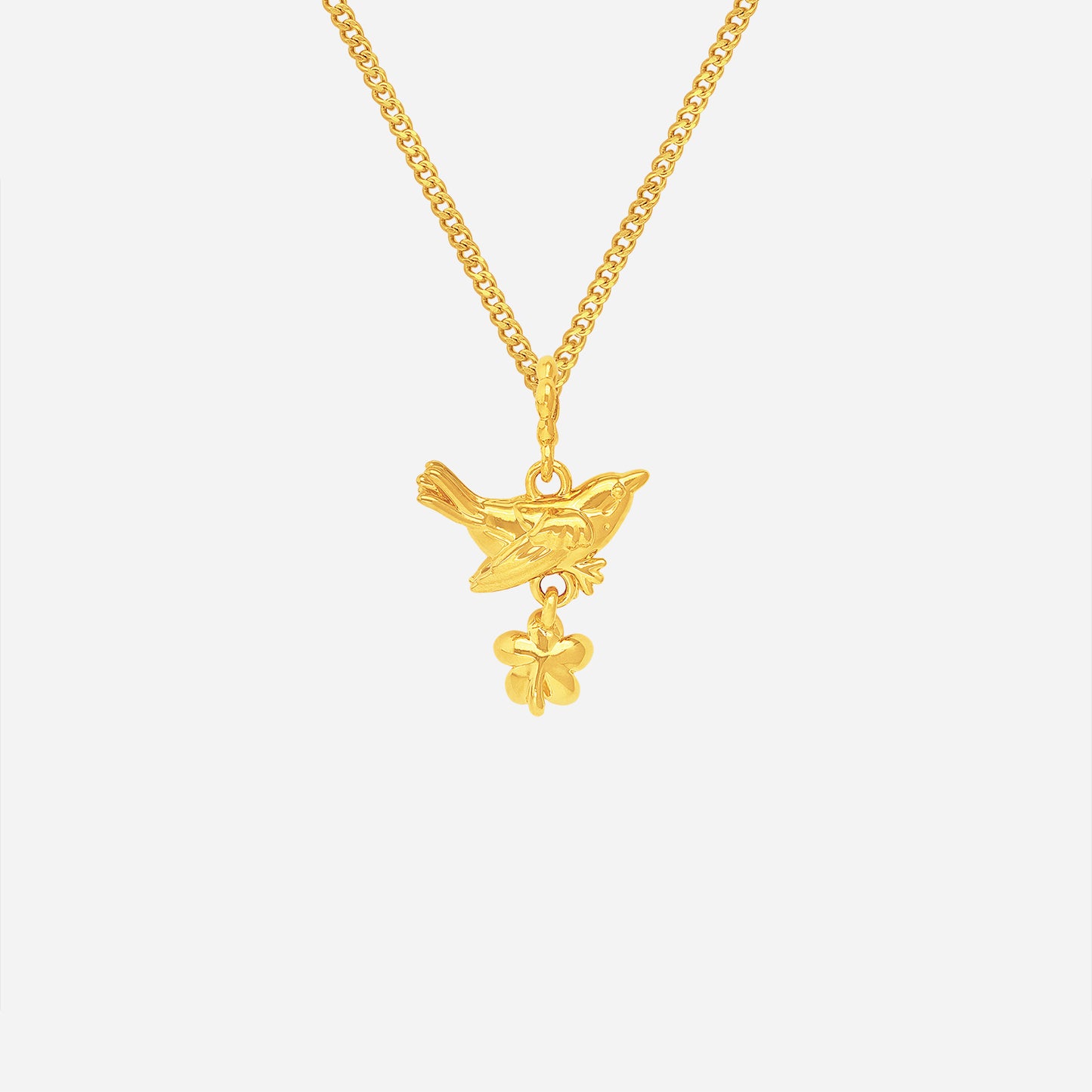blooming bird pendant in 22k yellow gold featuring an elegant bird design with a delicate flower charm below.