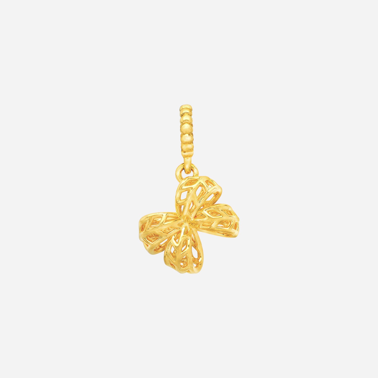 ribbon charm in 22k yellow gold with soft, rounded curves and intricate cut-out design for versatile wear.