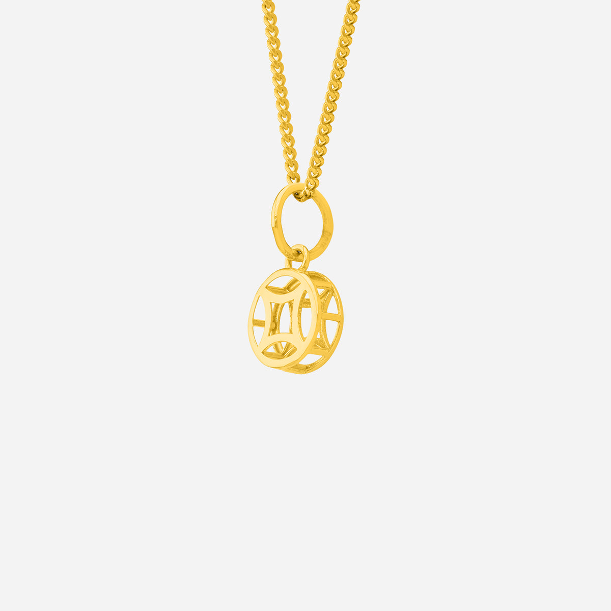 golden coin pendant in 22k yellow gold with a dimensional, cut-out design, hanging on a delicate chain.