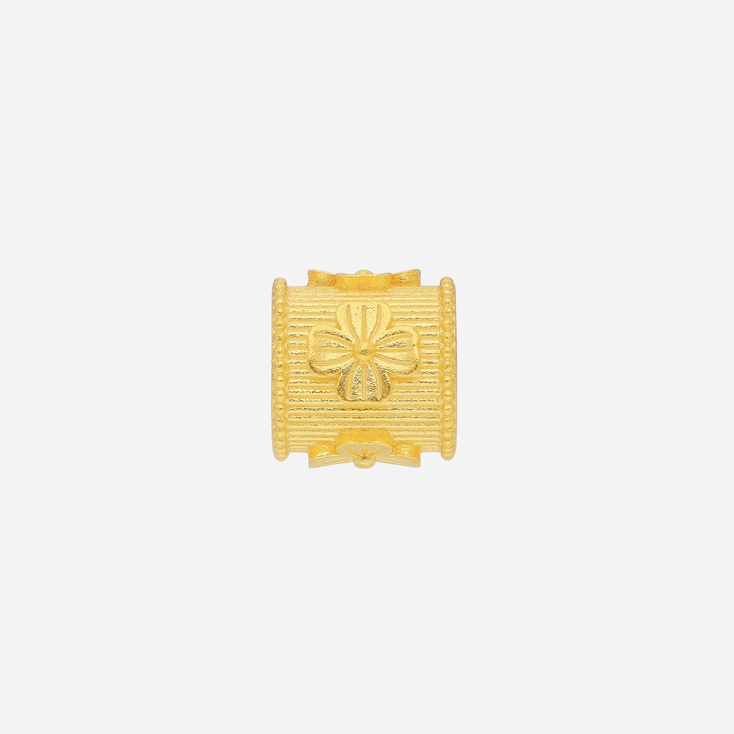 blooming floral charm in 22k yellow gold with cylindrical design and intricate ribbon-inspired floral patterns.