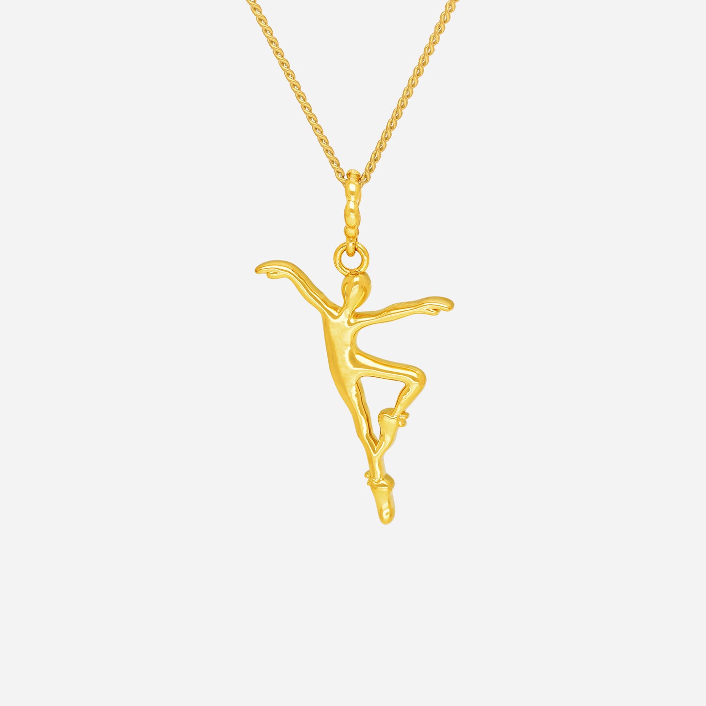 22k yellow gold ballerina pendant with elegant sculpted design, embodying grace and balance in motion.