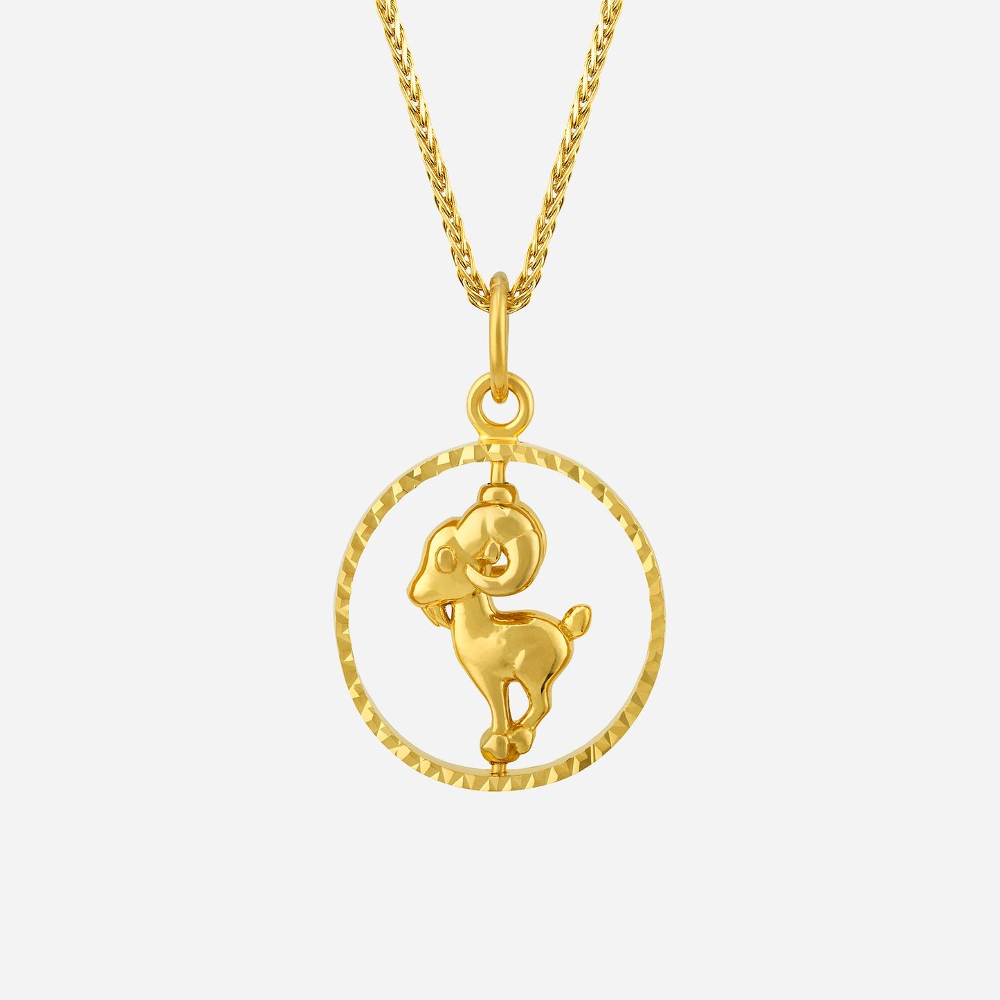 22k yellow gold goat pendant with gentle contours in a round design, embodying peace and serenity. chain not included.