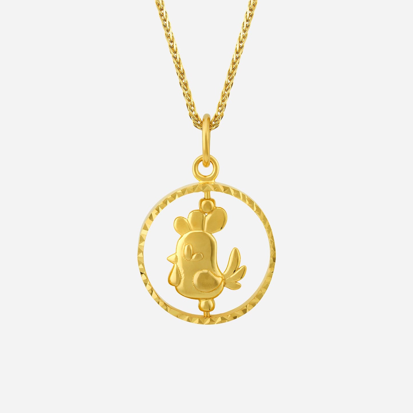 rooster pendant in 22k yellow gold with intricate details in a circular design, symbolizing confidence and achievement.