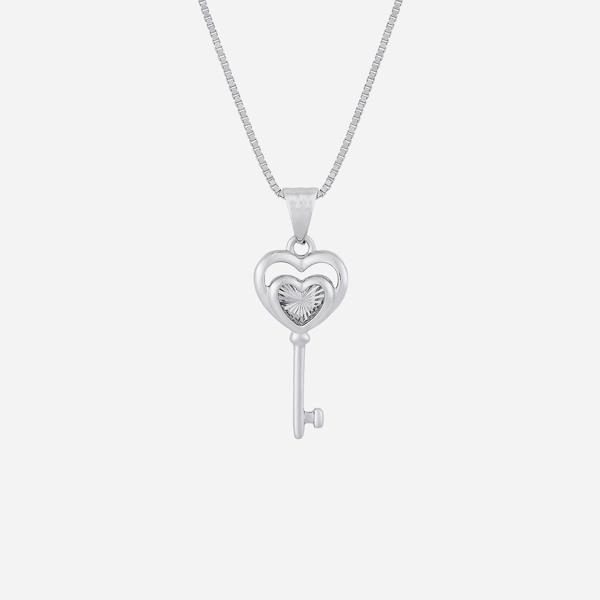 18k white gold heart-shaped key pendant featuring a sparkling gemstone in the heart design, elegant and sophisticated.