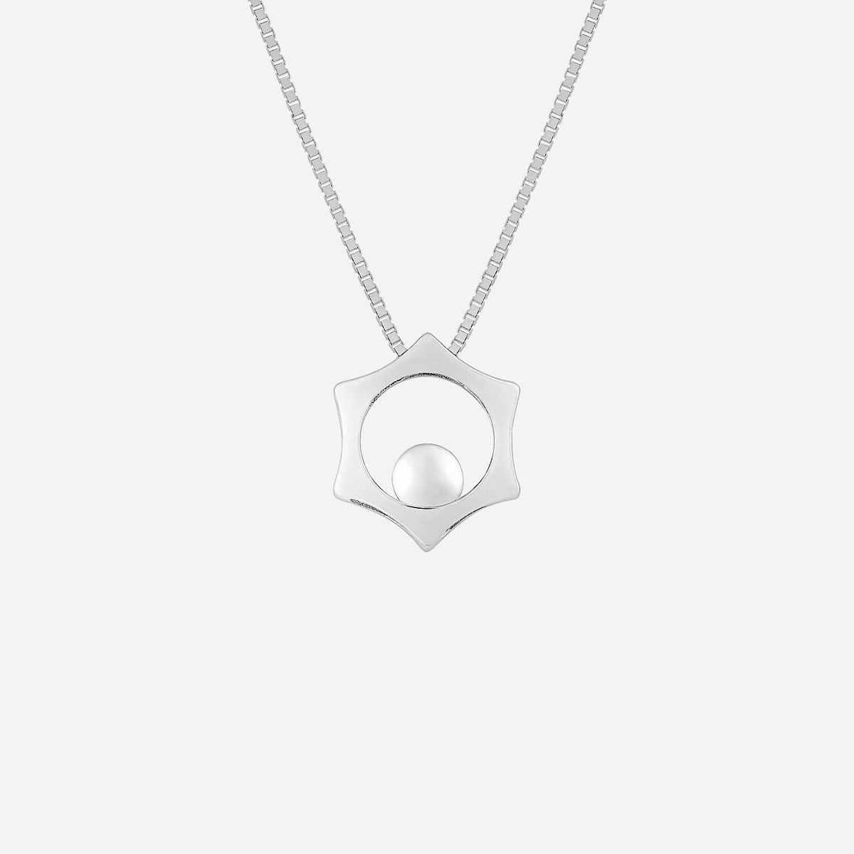 18k white gold star pendant with a polished sphere, featuring a sleek geometric design and a delicate chain.