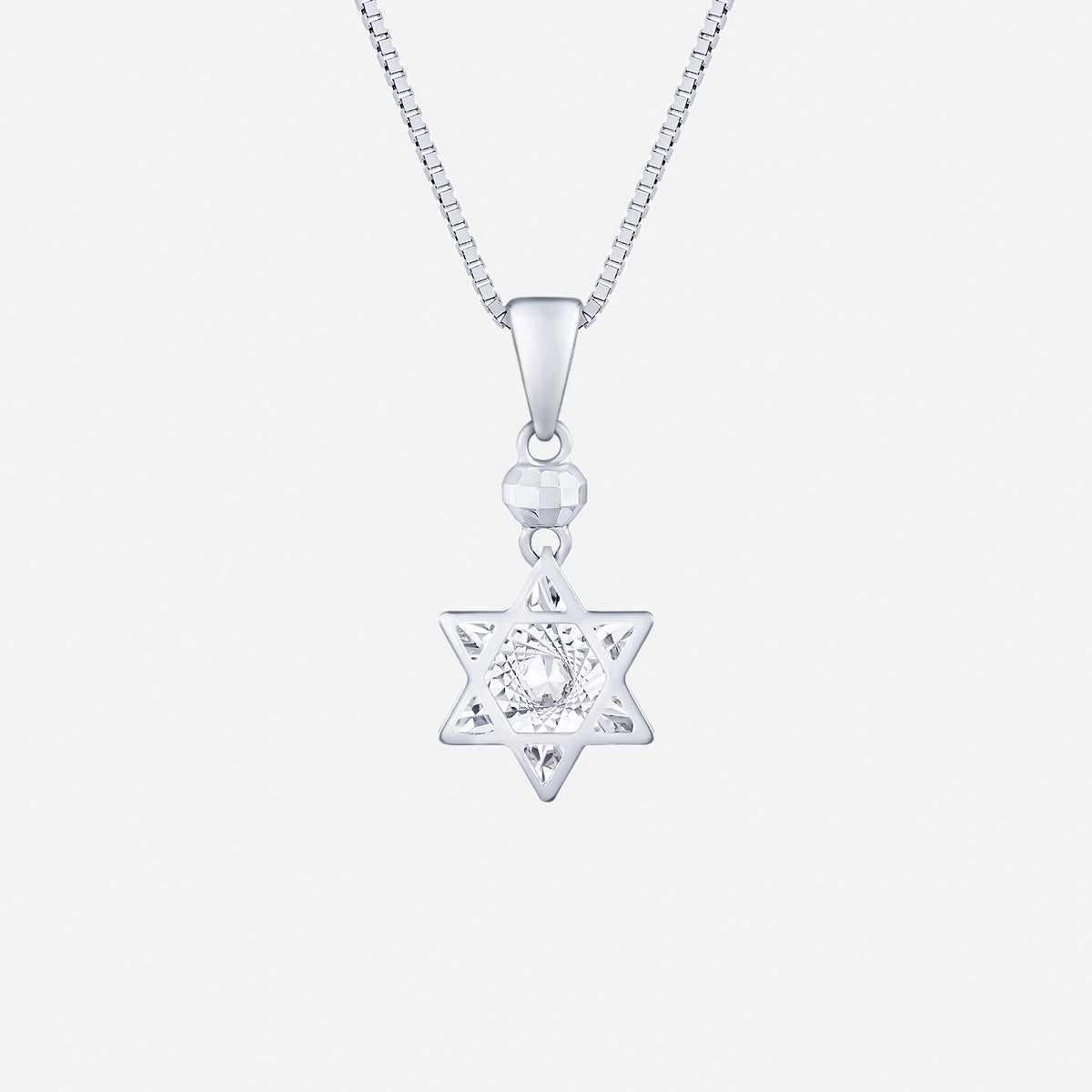 guiding star pendant in 18k white gold with faceted center and six-point star frame, perfect for elegance and aspiration.