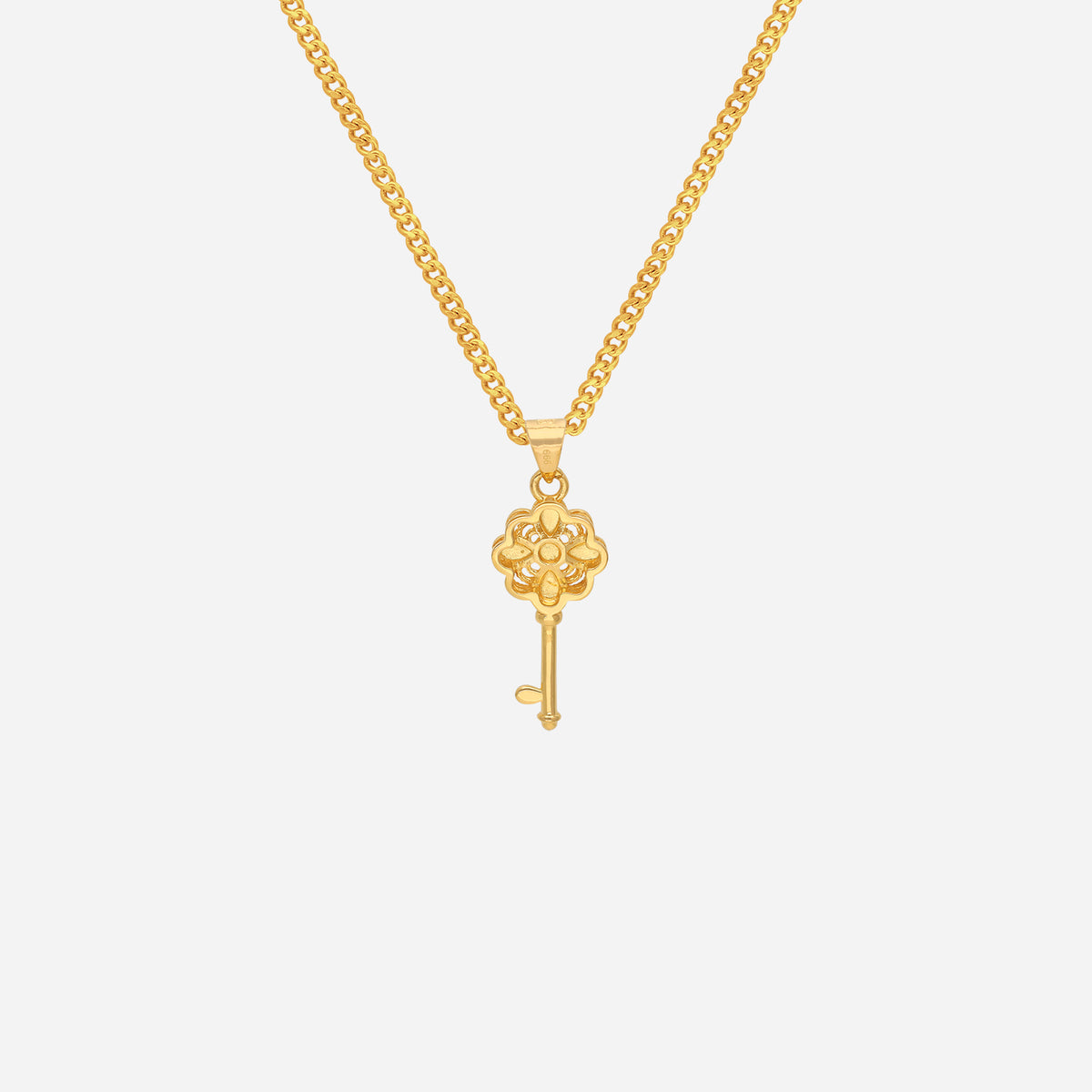 petal key pendant in 24k yellow gold with intricate floral design, symbolizing beauty and renewal. chain not included.