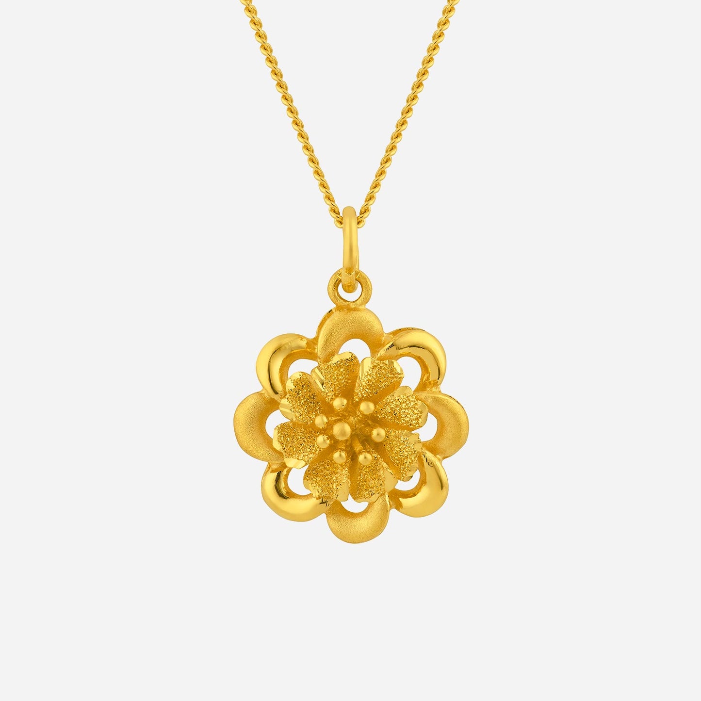flower pendant in 24k yellow gold featuring a detailed blooming design with textured petals and central beads.