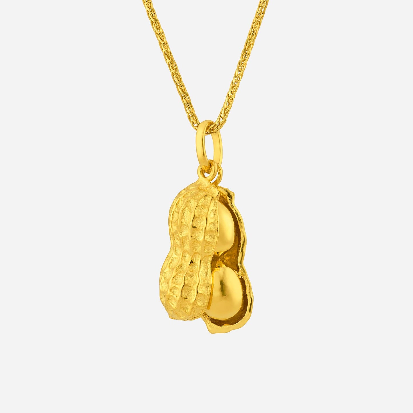 peanut pendant crafted in 24k yellow gold, featuring a detailed peanut shape with two exposed kernels.