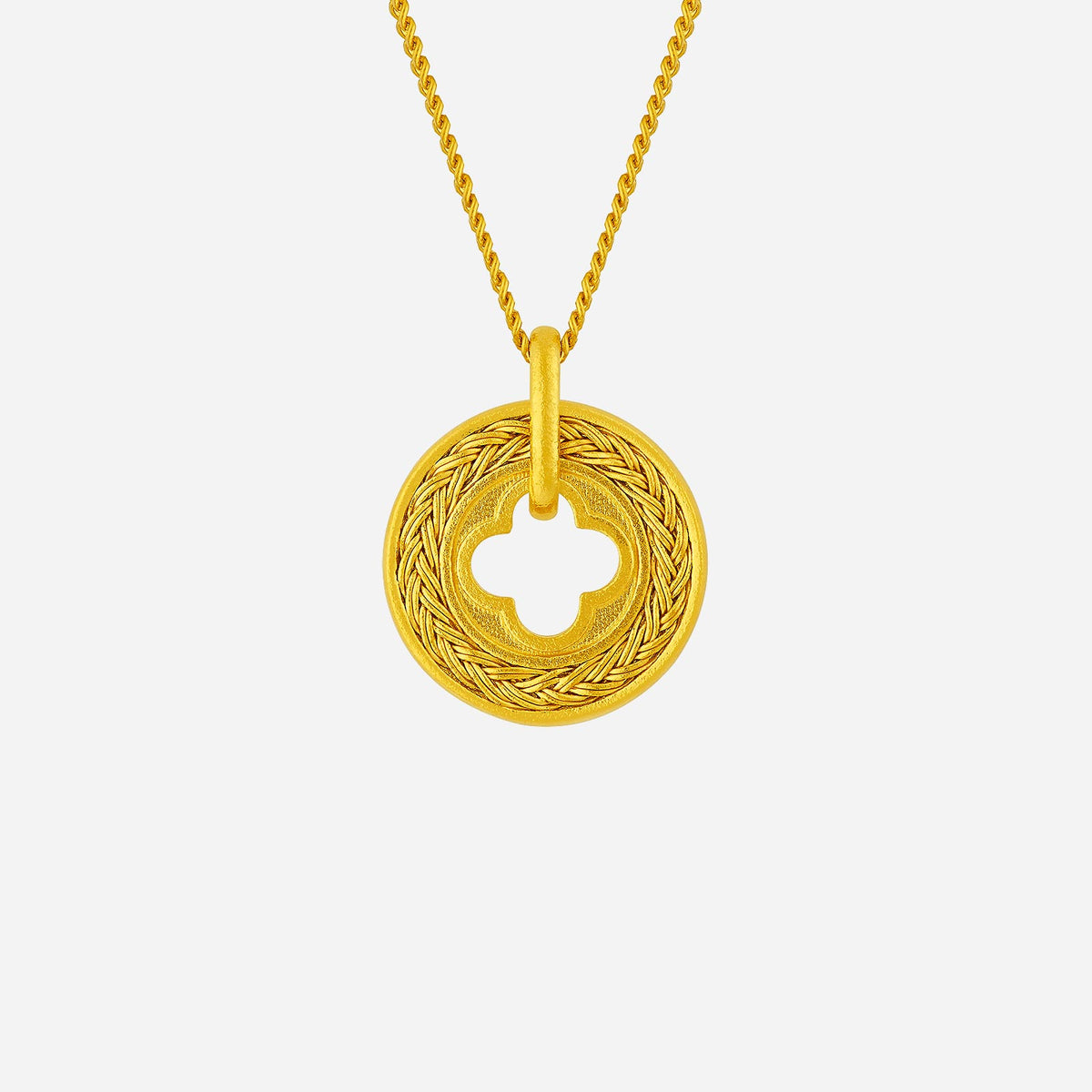 braid cornus pendant in 24k yellow gold with intricate braided design and a four-leaf clover cutout. chain sold separately.