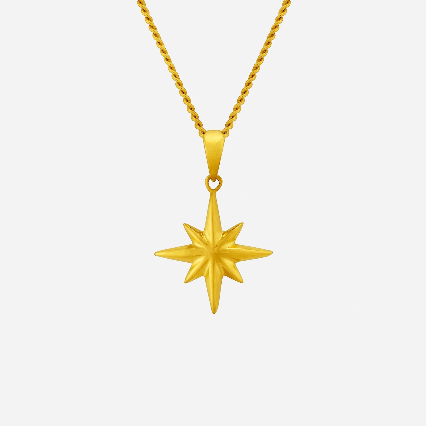 bling stellar pendant in 24k yellow gold with a star design, perfect for adding elegance and celestial sparkle.