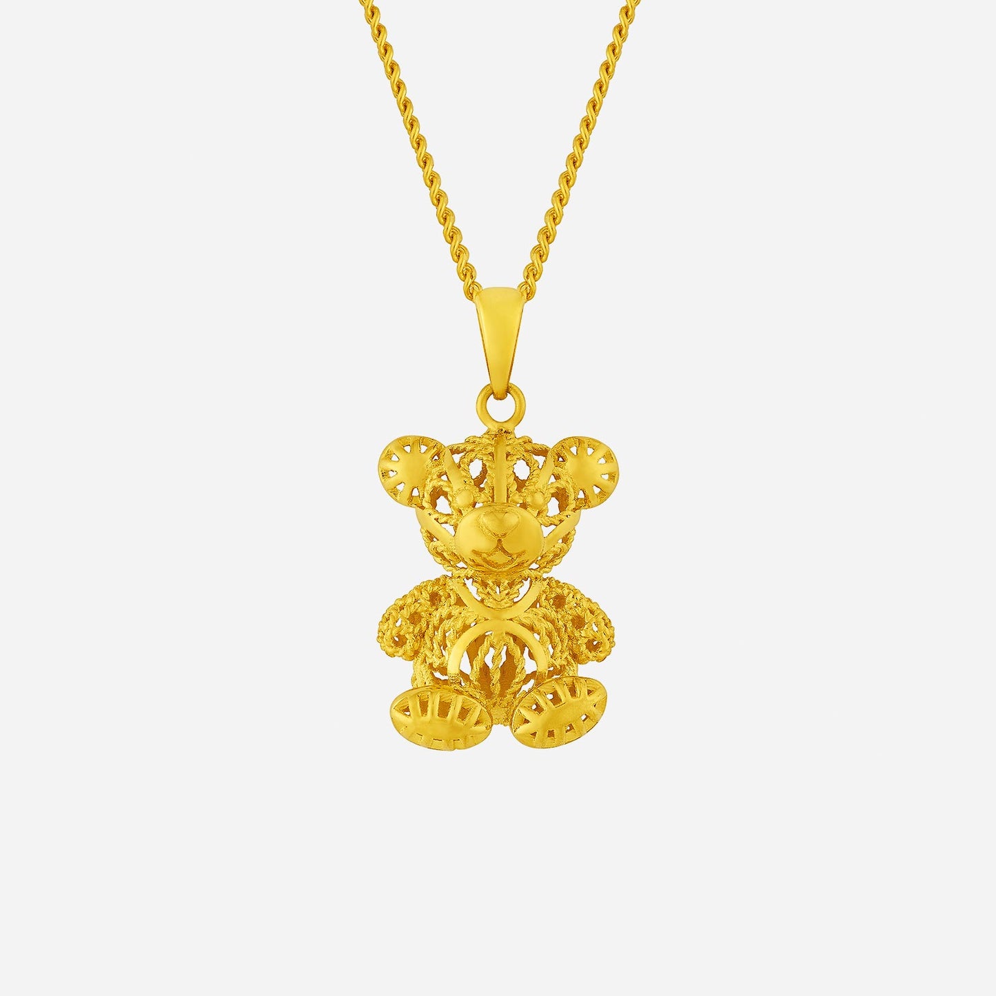 24k yellow gold teddy bear pendant with intricate detailing, symbolizing love and companionship in whimsical design.