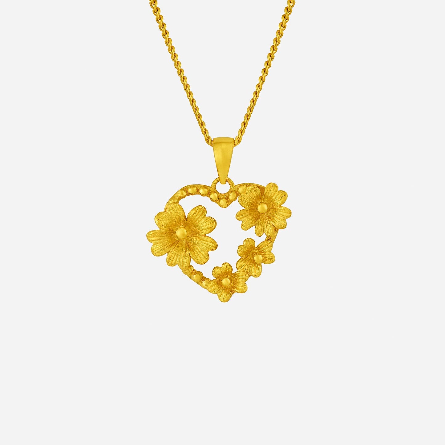 blossom heart pendant in 24k yellow gold with floral design, featuring intricate flower details and a romantic shape.