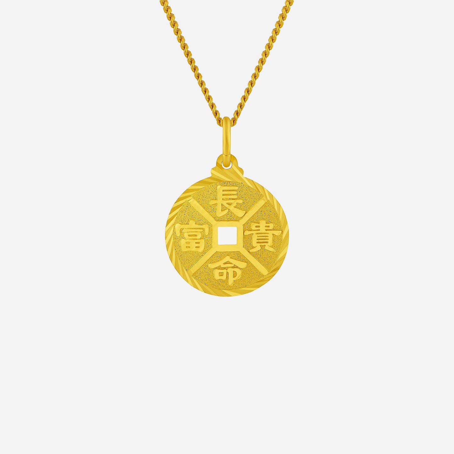 auspicious circular pendant in 24k yellow gold featuring engraved symbols and textured borders. chain sold separately.