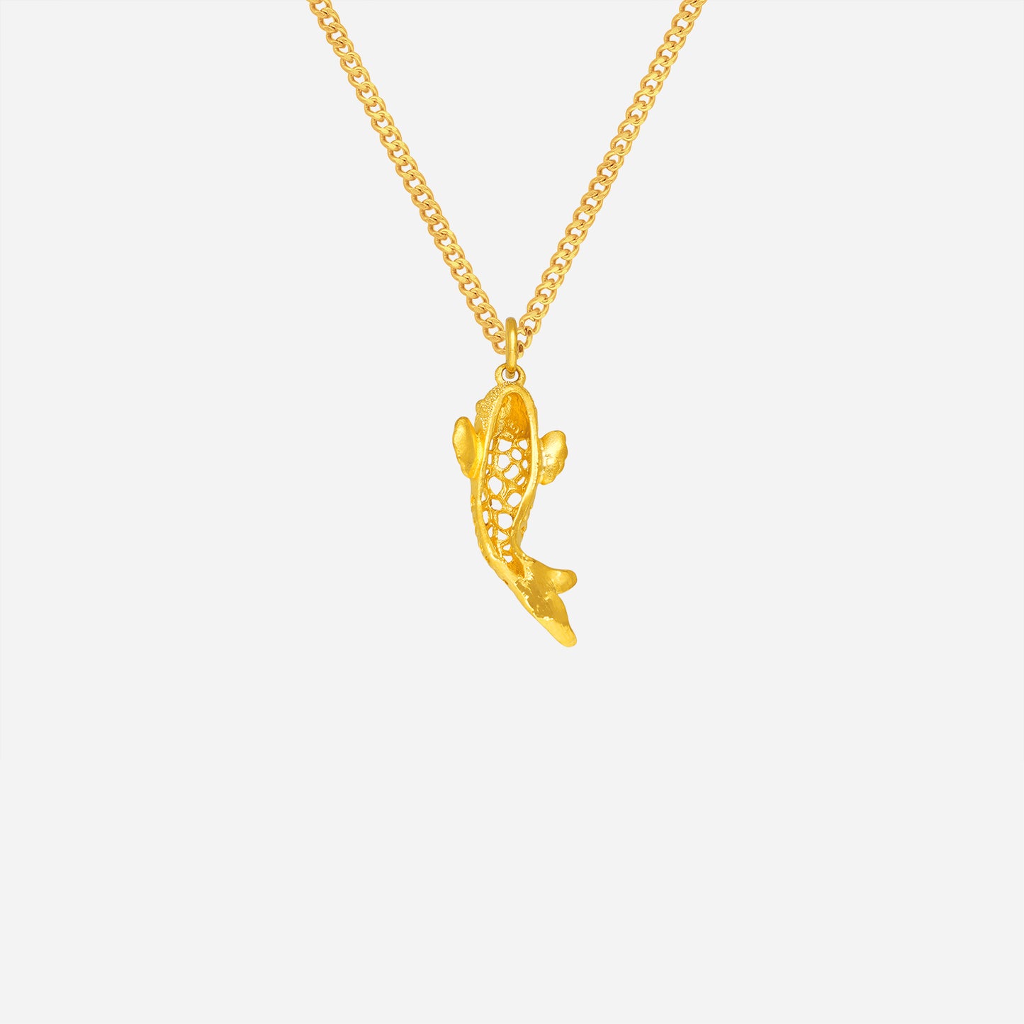 abundance fish pendant in 24k yellow gold with intricate openwork design and textured finish. symbol of prosperity and flow.