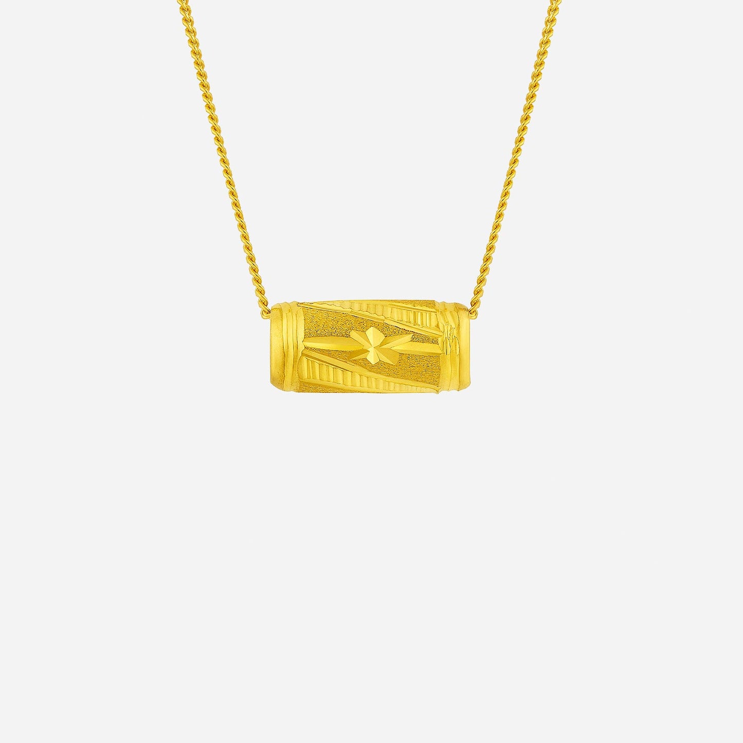 barrel pendant necklace in 24k yellow gold with polished cylindrical form and engraved motifs.