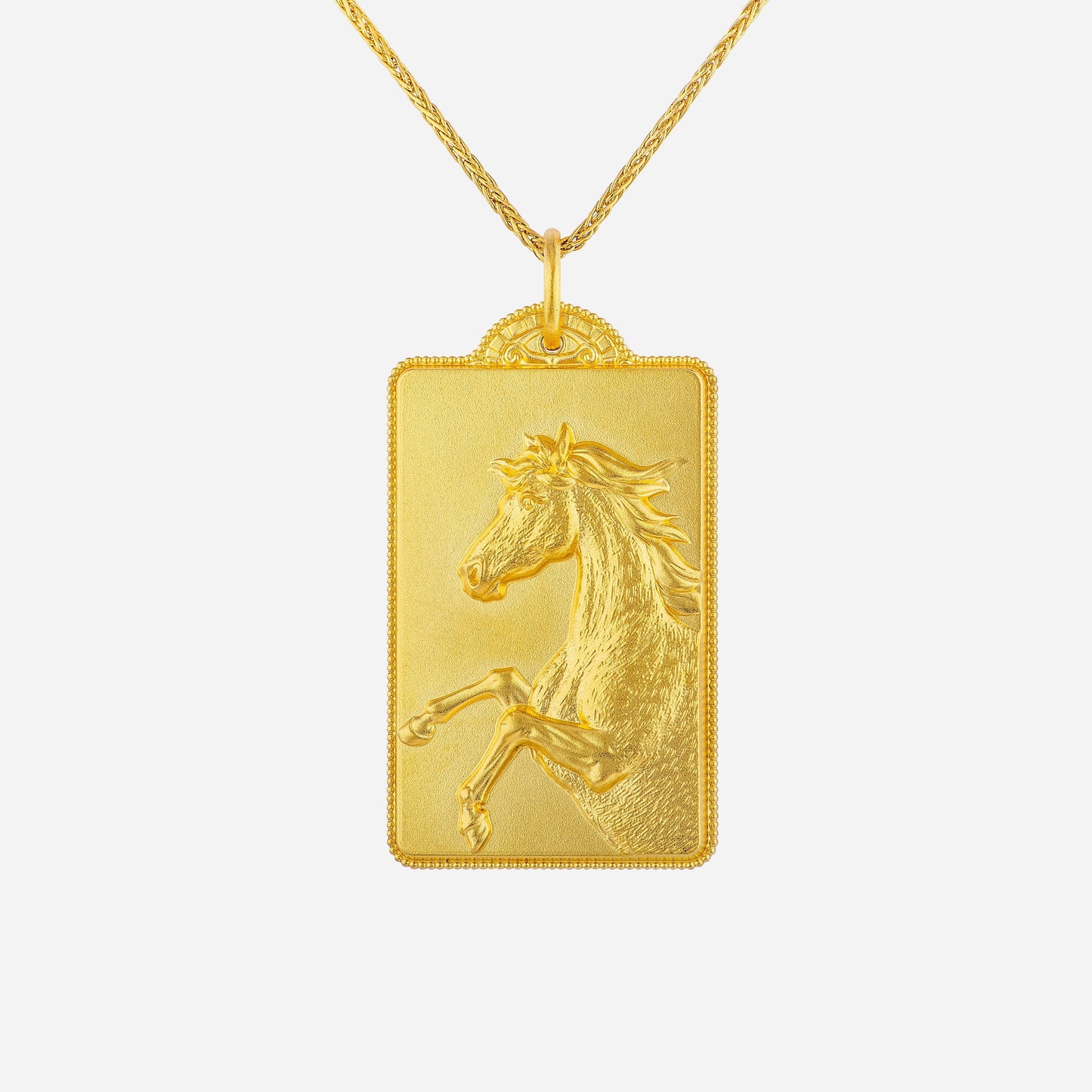 24k yellow gold horse pendant with sculpted rearing horse on a rectangular plaque, featuring a soft satin finish.