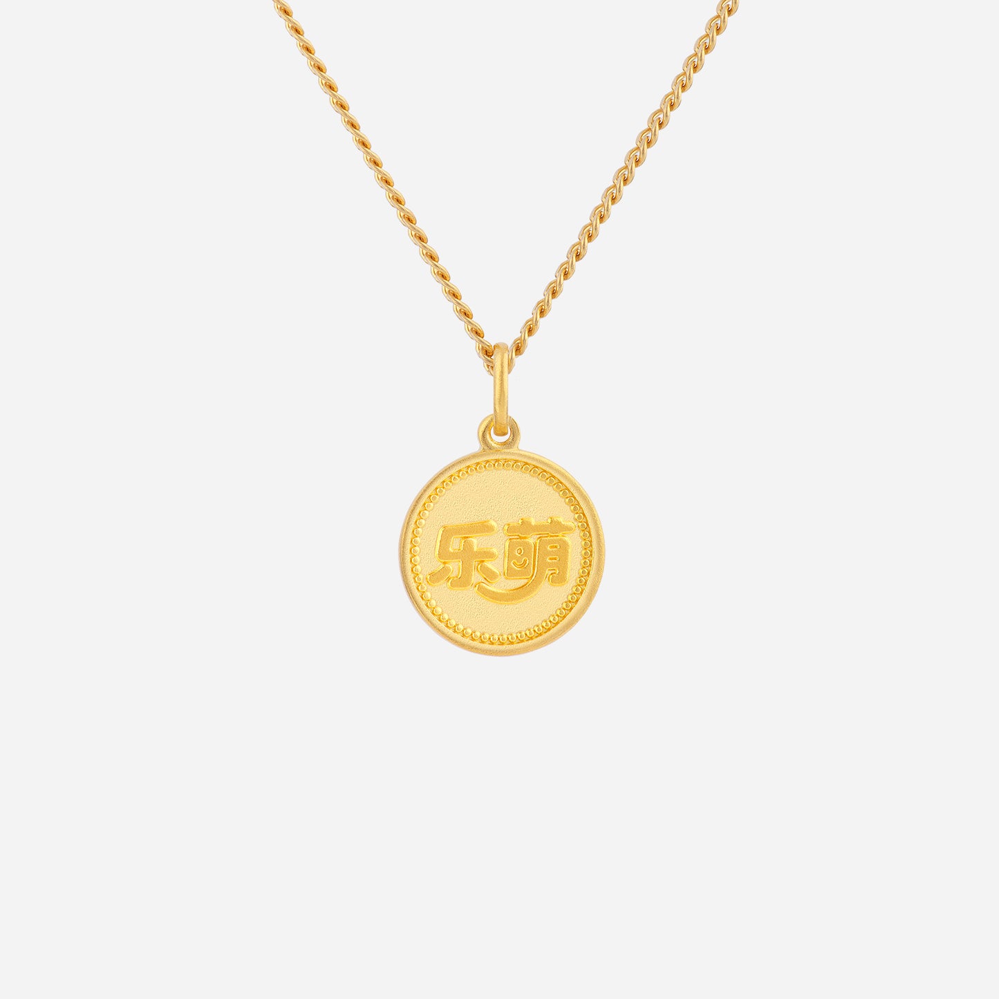 joyful horse pendant in 24k yellow gold with coin-inspired design and delicate beaded detailing. chain sold separately.